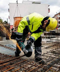 Pro Grade 18 Volt Cordless Angle Grinder With Brushless Motor And Quick Change Spindle for heavy duty metal cutting on jobsite.