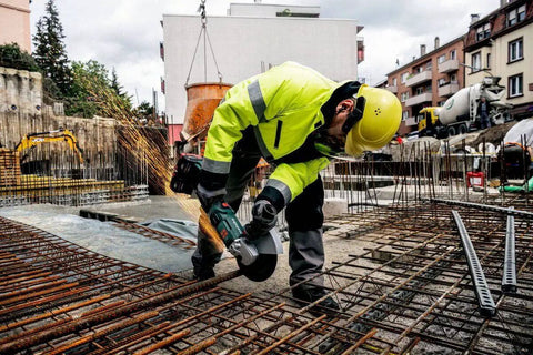 Pro Grade 18 Volt Cordless Angle Grinder With Brushless Motor And Quick Change Spindle for heavy duty metal cutting on jobsite.