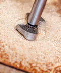 Workhorse Forstner Drill Bits Set Packing Two 24 And 25 Millimeter Cutters Featuring Razor Sharp Tungsten Carbide Heads in use on wood.