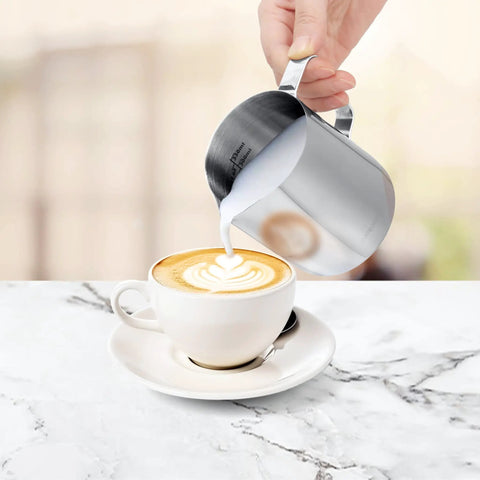 Pouring milk from 12 Oz Espresso Steaming Pitcher Pro Grade Stainless Steel Milk Frothing Cup For Home Barista Use, 350 Ml, Rust Resistant 304