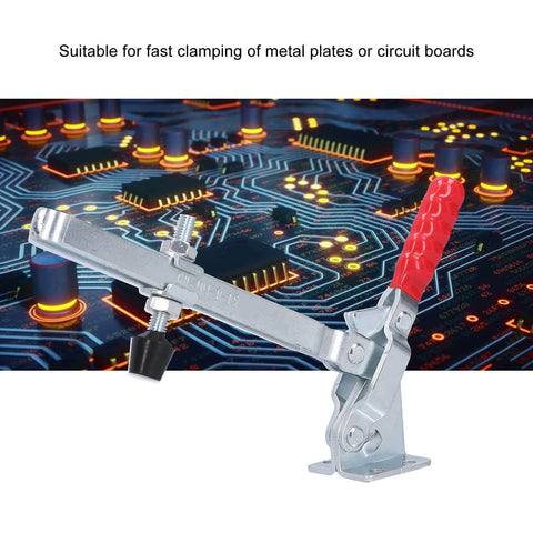 GH101 D15 180Kg Vertical Toggle Clamp For Woodworking And Welding Jigs with red handle and iron construction against circuit board background