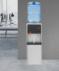 Office setting with Triple Temperature Water Dispenser With Hot Cold And Room Temperature Faucets, 5.02 Gallon Freestanding Electric Cooler And Heater.