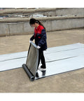 Person applying Rock Solid Self Adhesive Roofing Felt Membrane And Weatherproof Sealing Tape on a surface for durability.