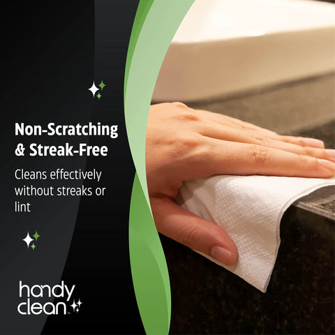 HandyClean pre-moistened lens cleaning wipes; black packaging with green accents, hand wiping a lens or screen.