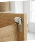 Heavy Duty Nylon Sliding Door Rollers With Smooth As Butter Ride For Cabinets And Drawer Units Features Six One Inch White Pulleys mounted on a wooden cabinet.