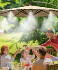Outdoor Patio Misting Kit With 63 Feet Of Line, 21 Brass Nozzles, And Brass Adapter cooling a seated group under an umbrella