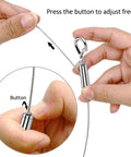 Close-up of hands adjusting Stainless Steel Picture Hanging Wire Kit, 25Kg Load, 2 Pack, Adjustable 2M Wire Rope With D Ring.