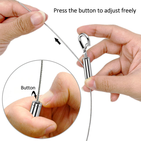 Close-up of hands adjusting Stainless Steel Picture Hanging Wire Kit, 25Kg Load, 2 Pack, Adjustable 2M Wire Rope With D Ring.