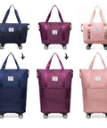 Set of six expandable foldable duffel bags with wheels in navy, burgundy, and pink.