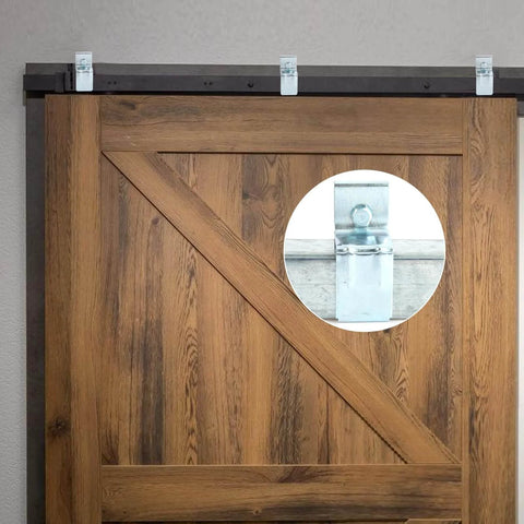 Heavy Duty Exterior Barn Door Hanger Brackets For Box Track System installed on wooden door, galvanized steel close-up