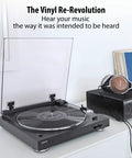 Denon Dp29F Fully Automatic Analog Turntable With Built In Phono Stage and transparent dust cover on display in home setting.