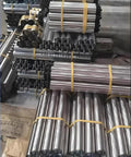 Heavy Duty Stainless Steel Conveyor Rollers 2 Inch Diameter Set Of 5 for Belt Conveyors and Gravity Rails, stacked on a pallet