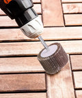 10Pcs Polishing Wheels For Rotary Tools With Brown Corundum Abrasive And Cloth Substrate being used on wooden surface