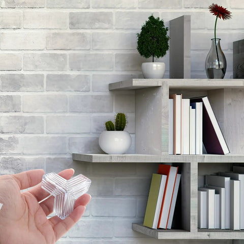 Hand holding 10 Pack Table Corner Guards For Kids And Pets, Soft PVC Edge Protectors For Furniture And Desks