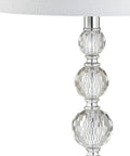 Close-up of Clear Crystal Faceted Orb Table Lamp with white drum shade, part of a set of 2, on a chrome base.