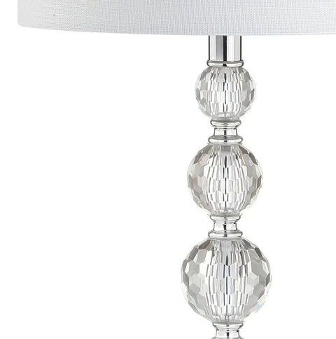 Close-up of Clear Crystal Faceted Orb Table Lamp with white drum shade, part of a set of 2, on a chrome base.