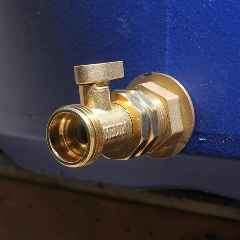 Heavy Duty Brass Garden Hose Shut Off Valve with Three Quarter Inch Male and Female Connectors installed on blue surface