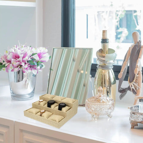 Straight Fire Nine Grid Watch Storage Tray With Plush Linen Cushion displaying watches on a stylish vanity surface.