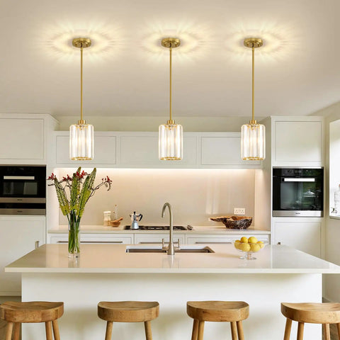 Top Shelf Modern Gold Pendant Lights 2 Pack Adjustable Crystal Chandelier Kitchen Island Fixture above a kitchen island.