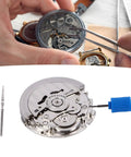 Hands working on metal mechanical watch movement spare part complete set with storage box, screws and seals for accuracy.