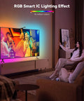 Living room with a TV displaying RGBIC LED TV Backlight Strip For 55 To 65 Inch TVs With Screen Sync And Music Control.