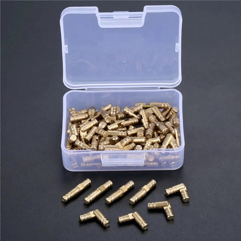 Open box displaying Beefy Solid Brass Concealed Barrel Hinges 100 Pack For Small Cabinets And Jewelry Boxes, 4x20mm, scattered and organized.