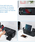 All-In-One Cable Management Box Kit For Desk And Floor Cord Organizer Hides Power Strips And Wires Includes 6 Cable Clips 10 Reusable Ties And Wall Hook For Easy Wall Mount In Home Office Black shown as phone stand with charging capability