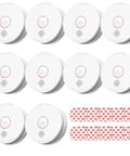Heavy Duty Smoke Detectors With 9V Replaceable Battery 360 Degree Coverage And A Killer 85 Decibels Car Horn Alert 10 Pack showing all units and installation pads.
