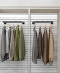 2 Pack Slatwall U Shaped Rectangular Tubing Hangrail 16x12 Inch For Retail Display And Home Apparel Storage Black Beefy Steel Built To Endure Daily Use shown with coats hanging in a closet.