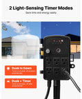 Heavy Duty Outdoor Power Stake With 100 Foot Extension Cord and six sockets with two light-sensing timer modes displayed.