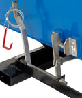 Close-up of the bump release mechanism for Heavy Duty Workhorse 3 Cubic Yard Self Dumping Forklift Hopper With Bump Release And 6000 Lb Capacity.