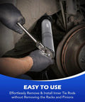 Close-up of Orion Motor Tech inner tie rod removal tool kit, 1/2-inch drive with adapters, in use on a vehicle.