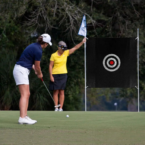 Golfer practicing with 57 Inch Silent Golf Practice Net With Colorful Target Cloth For Indoor And Outdoor Training in backyard