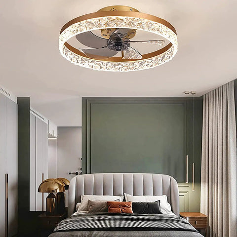 19.7 Inch Flush Mount Ceiling Fan With Lights Chandelier Style Remote Control mounted above a bed in a modern bedroom