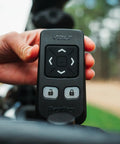 Close-up of remote control for Electric Golf Push Cart With Roomy Seat Featuring Full Directional Remote Nine Speed Levels.