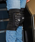 All Day Comfort Lightweight Padded Knee Sleeves With Breathable Mesh Back Contoured EVA Knee Pads Black Size L XL in use on worker's knees.