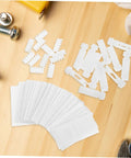 Vertical Blind Repair Kit 1 Set With Replacement Stems And Gears White For Smooth Operation No Hassle Easy Install Quick Fix Of Damaged Vertical Blind Components For Home And Office Use. White stems and gears for vertical blinds on wooden surface