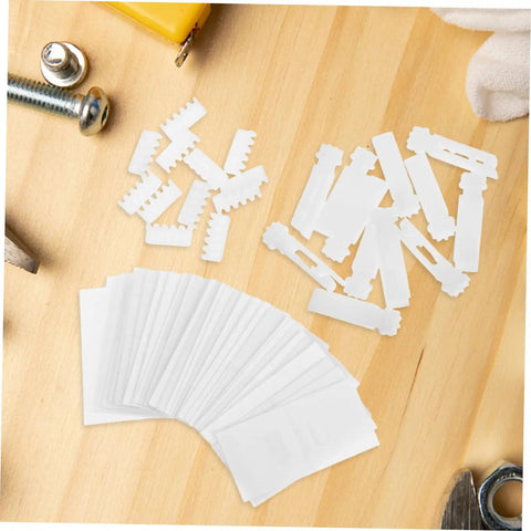 Vertical Blind Repair Kit 1 Set With Replacement Stems And Gears White For Smooth Operation No Hassle Easy Install Quick Fix Of Damaged Vertical Blind Components For Home And Office Use. White stems and gears for vertical blinds on wooden surface