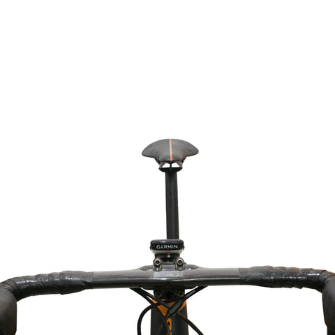 Front view of bicycle with Bicycle Stem Headset Top Cap Mount For Garmin Edge GPS Bike Computer attached below handlebars.