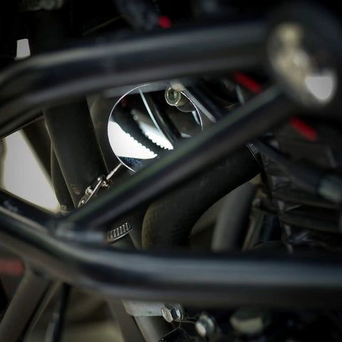 Close-up of Telescoping Inspection Mirror With 2-Inch Diameter Extends Up To 28 Inches Multi-Angle Ball Joint Neck And Stainless Steel Antenna inspecting engine components