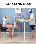 Built Different Crank Adjustable Height Standing Desk, Super Smooth Sit Stand Converter for Bedroom or Office Space, user typing standing