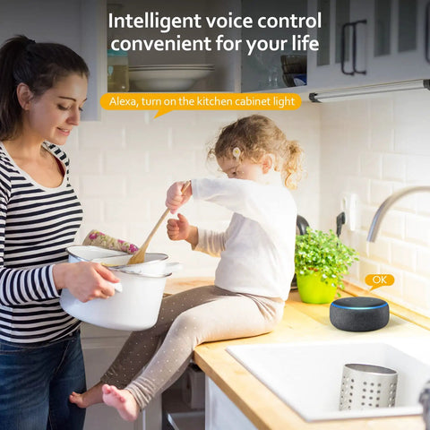 Mother and child in kitchen using voice control for Smart Under Cabinet Lighting Kit With Dimmable LED Strip Lights 24V Plug In Linkable Bar Lights For Pantry Kitchen Shelves Bookcases And Display Showcases 6 Pack Cold White No Fuss Easy Install