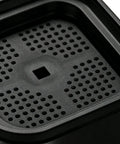 Close-up of heavy-duty anti vibration pad for washing machines and dryers, featuring shock absorbing guards and floor protection