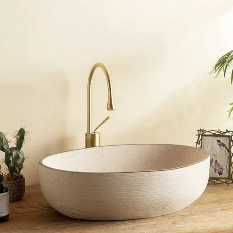 Retro Oval Ceramic Vessel Sink for Bathroom Vanity, modern design with a dark brushed texture, size 22.8x15.7x5.1 in.