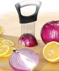 Onion Holder Slicer And Multifunction Kitchen Cutter slicing red onion and lemons on a cutting board with no slip grip