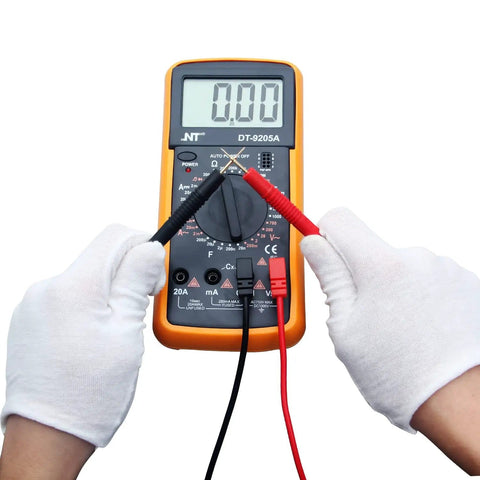 Hands using Flexible Multimeter Test Lead Kit with CAT III 1000V 10A safety on digital multimeter, gold plated 4mm probes.