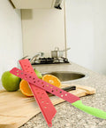Watermelon Cutter With Sleeve Long Serrated Knife for Melon Cutting Bread and Veggie Knife in kitchen setting