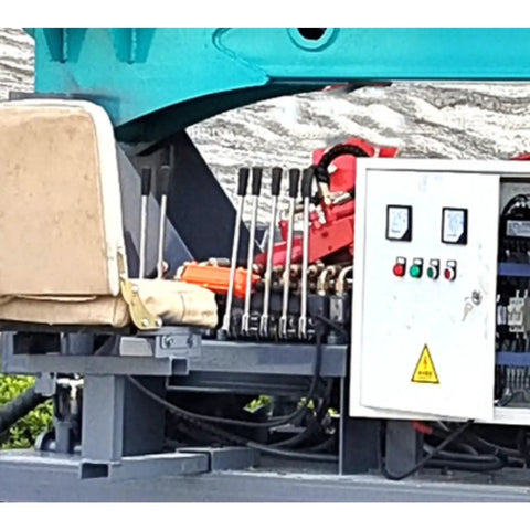 Control panel and seat of Beefy Hydraulic Guardrail Pile Driver Machine for post installation and highway roadside construction
