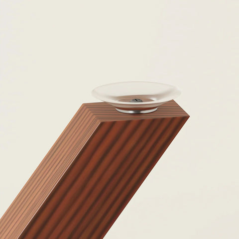 Close-up of walnut-colored 28 inch heavy duty table leg with suction cup and pre drilled hole for glass marble wood tops