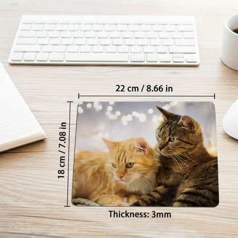 Close-up of a 22x18 cm, 3mm thick mouse pad featuring two cats print. Twenty Pack White Mouse Pads 3mm Thick For Heat Press Printing Bulk Mousepad Blanks For Heat Transfer Crafts 22x18x0.3 Cm Compatible With Wired Wireless Optical Mechanical And Laser Mice Awesome For Personal Photos Logos And Gifts.